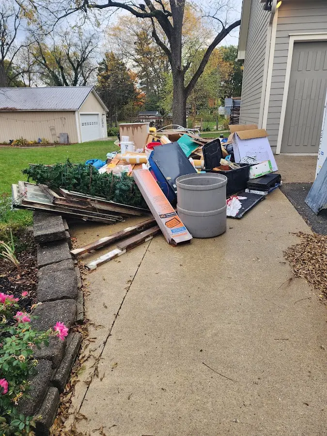 Dumpster being loaded with debris for Residential Dumpster Rental in Lemon Grove
